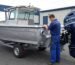 Outboard motor sizing guide beside an Australian aluminium boat